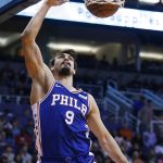 Philadelphia 76ers forward Dario Saric dunks against the Phoenix Suns during the first half of an NBA basketball game Sunday, Dec. 31, 2017, in Phoenix. (AP Photo/Ross D. Franklin)