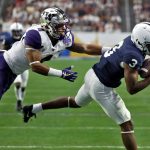 Penn State wide receiver DeAndre Thompkins (3) pulls in a pass as Washington defensive back Austin Joyner (4) defends during the first half of the Fiesta Bowl NCAA college football game Saturday, Dec. 30, 2017, in Glendale, Ariz. (AP Photo/Rick Scuteri)