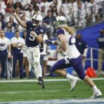 Penn State quarterback Trace McSorley (9) throws as Washington linebacker Connor O'Brien (29) pursues during the first half of the Fiesta Bowl NCAA college football game, Saturday, Dec. 30, 2017, in Glendale, Ariz. (AP Photo/Ross D. Franklin)