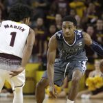 Longwood guard B.K. Ashe (2) drives on Arizona State guard Remy Martin in the first half during an NCAA college basketball game, Tuesday, Dec 19, 2017, in Tempe, Ariz. (AP Photo/Rick Scuteri)