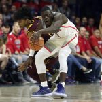 Arizona State guard Remy Martin, left, reaches to steal the ball from Arizona guard Rawle Alkins (1) during the first half of an NCAA college basketball game, Saturday, Dec. 30, 2017, in Tucson, Ariz. (AP Photo/Ralph Freso)