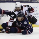 Arizona Coyotes' Anthony Duclair, top, and Columbus Blue Jackets' Jack Johnson fight for the puck during the third period of an NHL hockey game Saturday, Dec. 9, 2017, in Columbus, Ohio. (AP Photo/Jay LaPrete)