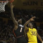Pacific guard Lafayette Dorsey (1) drives past Arizona State forward De'Quon Lake in the first half during an NCAA college basketball game, Friday, Dec 22, 2017, in Tempe, Ariz. (AP Photo/Rick Scuteri)