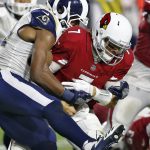 Arizona Cardinals quarterback Blaine Gabbert (7) is sacked by Los Angeles Rams outside linebacker Robert Quinn during the second half of an NFL football game, Sunday, Dec. 3, 2017, in Glendale, Ariz. The Rams won 32-16. (AP Photo/Ross D. Franklin)
