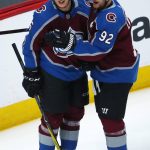 Colorado Avalanche right wing Mikko Rantanen, left, of Finland, is congratulated after his goal by left wing Gabriel Landeskog, of Sweden, against the Arizona Coyotes in the first period of an NHL hockey game Wednesday, Dec. 27, 2017, in Denver. (AP Photo/David Zalubowski)