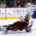Toronto Maple Leafs center Patrick Marleau, right, scores a goal against Arizona Coyotes goalie Scott Wedgewood during the second period of an NHL hockey game Thursday, Dec. 28, 2017, in Glendale, Ariz (AP Photo/Ross D. Franklin)