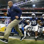 Penn State head coach James Franklin takes the field with his team prior to the Fiesta Bowl NCAA college football game against Washington, Saturday, Dec. 30, 2017, in Glendale, Ariz. (AP Photo/Ross D. Franklin)