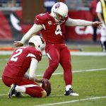 Arizona Cardinals kicker Phil Dawson (4) kick a field goal against the New York Giants as punter Andy Lee (2) holds during the first half of an NFL football game, Sunday, Dec. 24, 2017, in Glendale, Ariz. (AP Photo/Ross D. Franklin)