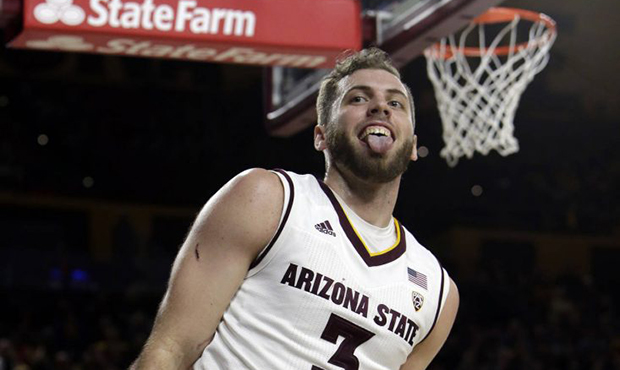 Arizona State forward Mickey Mitchell reacts after dunking the ball against Longwood in the second ...