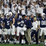 Penn State players celebrate during the final seconds of the second half of the Fiesta Bowl NCAA college football game against Washington, Saturday, Dec. 30, 2017, in Glendale, Ariz. (AP Photo/Ross D. Franklin)