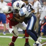 Arizona Cardinals outside linebacker Chandler Jones (55) makes a tackle against Tennessee Titans running back Derrick Henry (22) during the first half of an NFL football game, Sunday, Dec.10, 2017, in Glendale, Ariz. (AP Photo/Rick Scuteri)