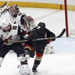 Arizona Coyotes goalie Antti Raanta (32) gives up a goal to Anaheim Ducks' Cam Fowler, not seen, as Coyotes defenseman Alex Goligoski, front left, defends Ducks left winger Andrew Cogliano (7) during the third period of an NHL hockey game in Anaheim, Calif., Sunday, Dec. 31, 2017. The Ducks won 5-2. (AP Photo/Reed Saxon)