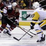 Arizona Coyotes center Clayton Keller (9) carries the puck in the second period of an NHL hockey game against the Pittsburgh Penguins, Saturday, Dec 16, 2017, in Glendale, Ariz. (AP Photo/Rick Scuteri)