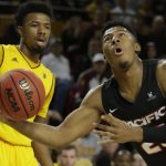 Pacific guard Kendall Small (25) shoots in front of Arizona State guard Shannon Evans II in the first half during an NCAA college basketball game, Friday, Dec 22, 2017, in Tempe, Ariz. (AP Photo/Rick Scuteri)