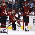 Arizona Coyotes defenseman Luke Schenn (2), goalie Antti Raanta, middle, and defenseman Kevin Connauton, right, pause on the ice after a goal by Florida Panthers center Nick Bjugstad during the second period of an NHL hockey game, Tuesday, Dec. 19, 2017, in Glendale, Ariz. The Panthers defeated the Coyotes 3-2. (AP Photo/Ross Franklin)