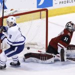 Toronto Maple Leafs center Zach Hyman (11) scores a short-handed goal against Arizona Coyotes goalie Scott Wedgewood (31) during the first period of an NHL hockey game Thursday, Dec. 28, 2017, in Glendale, Ariz. (AP Photo/Ross D. Franklin)