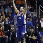 Philadelphia 76ers guard JJ Redick celebrates a 3-pointer against the Phoenix Suns during the second half of an NBA basketball game Sunday, Dec. 31, 2017, in Phoenix. The 76ers defeated the Suns 123-110. (AP Photo/Ross D. Franklin)