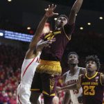 Arizona State guard Shannon Evans II (11) drives to the basket past Arizona's Allonzo Trier, left, during the first half of an NCAA college basketball game Saturday, Dec. 30, 2017, in Tucson, Ariz. (AP Photo/Ralph Freso)