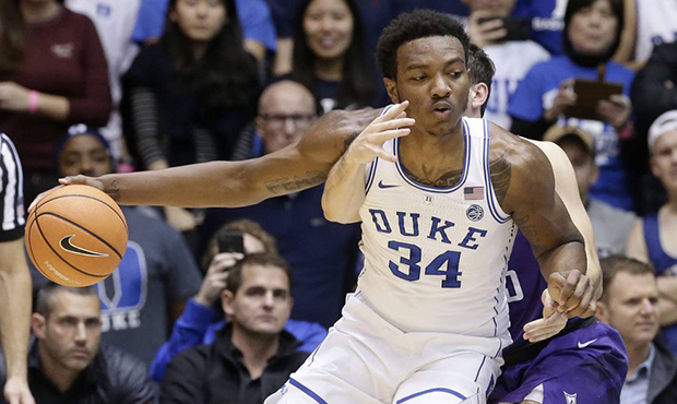 Duke's Wendell Carter Jr (34) is pressured by Furman's Clay Mounce during the second half of an NCA...