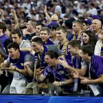 Washington fans celebrate a touchdown during the second half of the Fiesta Bowl NCAA college football game against Penn State, Saturday, Dec. 30, 2017, in Glendale, Ariz. (AP Photo/Ross D. Franklin)