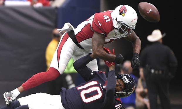 Arizona Cardinals strong safety Antoine Bethea (41) breaks up a pass intended for Houston Texans wi...