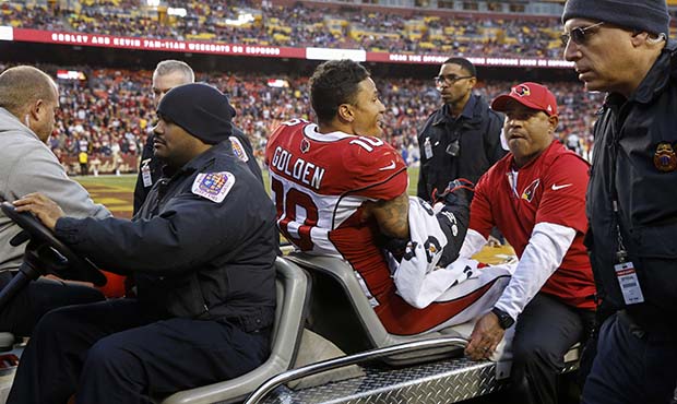 Arizona Cardinals wide receiver Brittan Golden (10) leaves the field after an injury during the sec...