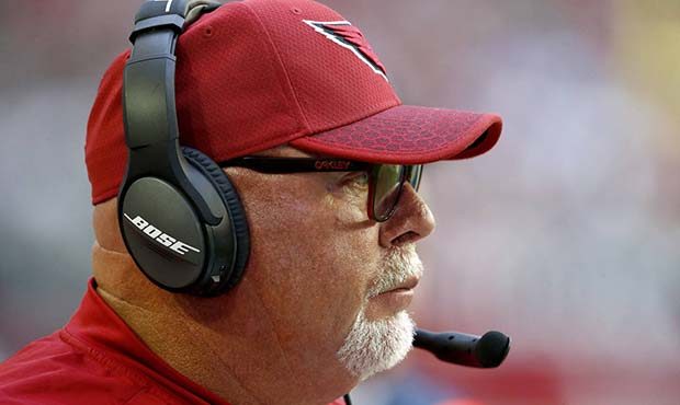 Arizona Cardinals head coach Bruce Arians watches during the first half of an NFL football game aga...