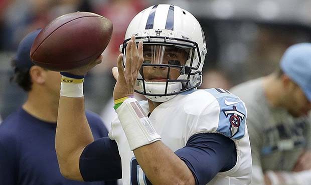 Tennessee Titans quarterback Marcus Mariota warms up prior to an NFL football game against the Ariz...