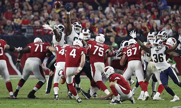 Arizona Cardinals kicker Phil Dawson (4) kicks a field goal during the second half of an NFL footba...