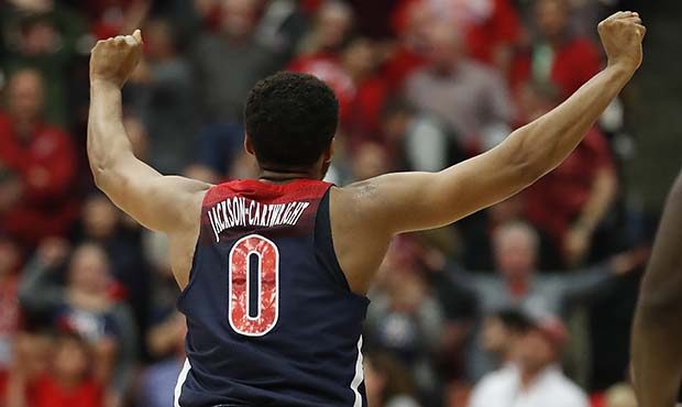 Arizona guard Parker Jackson-Cartwright (0) celebrates after a  victory against Stanford in an NCAA...