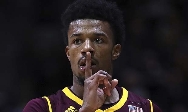 Arizona State's Shannon Evans II gestures after scoring against California during the second half o...