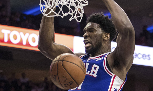 FILE - In this Dec. 7, 2017, file photo, Philadelphia 76ers' Joel Embiid, of Cameroon, dunks during...