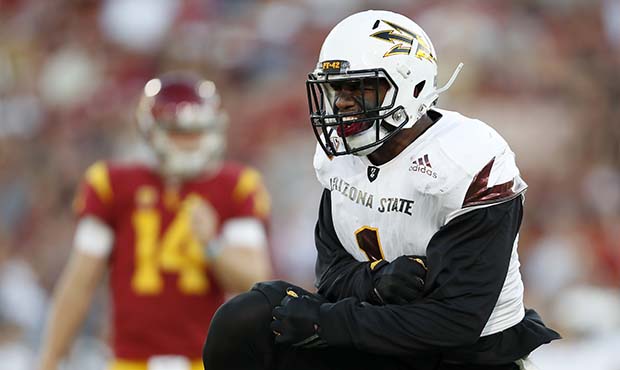 Arizona State defensive lineman JoJo Wicker (1) celebrates after making a tackle during the first h...