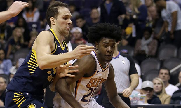 Phoenix Suns forward Josh Jackson (20) drives on Indiana Pacers forward Bojan Bogdanovic in the sec...