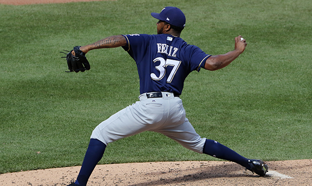 Milwaukee Brewers relief pitcher Neftali Feliz delivers in the ninth inning of a baseball game agai...