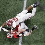 Alabama's Raekwon Davis sacks Georgia's Jake Fromm during the second half of the NCAA college football playoff championship game Monday, Jan. 8, 2018, in Atlanta. (AP Photo/John Bazemore)