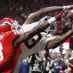 Georgia's Deandre Baker knocks the ball away from Alabama's Calvin Ridley during the second half of the NCAA college football playoff championship game Monday, Jan. 8, 2018, in Atlanta. (AP Photo/David Goldman)