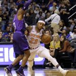 New York Knicks guard Trey Burke (23) drives as Phoenix Suns guard Tyler Ulis defends during the first half during an NBA basketball game Friday, Jan. 26, 2018, in Phoenix. (AP Photo/Rick Scuteri)