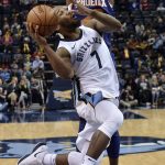 Memphis Grizzlies guard Wayne Selden (7) shoots against Phoenix Suns forward Josh Jackson in the first half of an NBA basketball game Monday, Jan. 29, 2018, in Memphis, Tenn. (AP Photo/Brandon Dill)