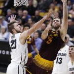 Arizona State forward Mickey Mitchell shoots over Colorado forward Lucas Siewert during the first half of an NCAA college basketball game Thursday, Jan. 4, 2018, in Boulder, Colo. (AP Photo/David Zalubowski)