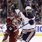 Edmonton Oilers left wing Jujhar Khaira, right, celebrates a goal by Oilers defenseman Darnell Nurse against Arizona Coyotes goaltender Antti Raanta (32) as Coyotes defenseman Oliver Ekman-Larsson (23) looks on during the first period of an NHL hockey game, Friday, Jan. 12, 2018, in Glendale, Ariz. (AP Photo/Ross D. Franklin)