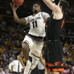 Arizona State guard Shannon Evans II (11) drives on Oregon State forward Drew Eubanks during the second half of an NCAA college basketball game, Saturday, Jan. 13, 2018, in Tempe, Ariz. Arizona State defeated Oregon State 77-75. (AP Photo/Rick Scuteri)