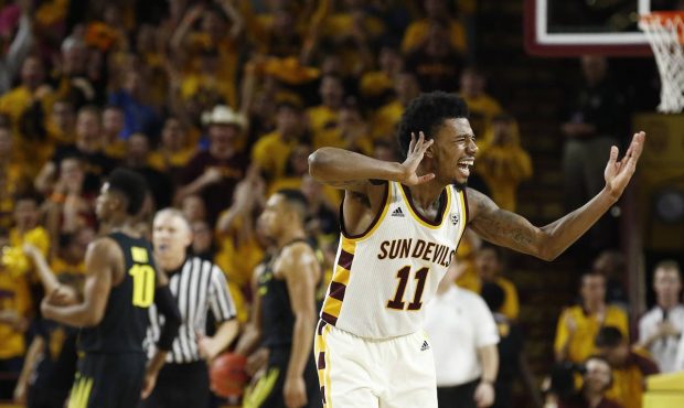 Arizona State guard Shannon Evans II (11) celebrates with the cheering crowd after a making basket ...