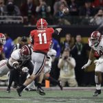 Georgia quarterback Jake Frommthrows during the first half of the NCAA college football playoff championship game against Alabama Monday, Jan. 8, 2018, in Atlanta. (AP Photo/David J. Phillip)