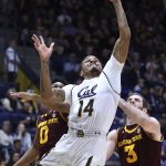 California's Don Coleman (14) lays up a shot past Arizona State's Tra Holder, left, and Mickey Mitchell (3) during the first half of an NCAA college basketball game Saturday, Jan. 20, 2018, in Berkeley, Calif. (AP Photo/Ben Margot)
