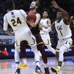 California's Marcus Lee (24) and Darius McNeill, right, defend against Arizona State's Mickey Mitchell, center, during the second half of an NCAA college basketball game Saturday, Jan. 20, 2018, in Berkeley, Calif. (AP Photo/Ben Margot)