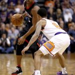 Houston Rockets guard Demetrius Jackson (2) is defended by Phoenix Suns guard Tyler Ulis (8) during the first half of an NBA basketball game, Friday, Jan. 12, 2018, in Phoenix. (AP Photo/Matt York)