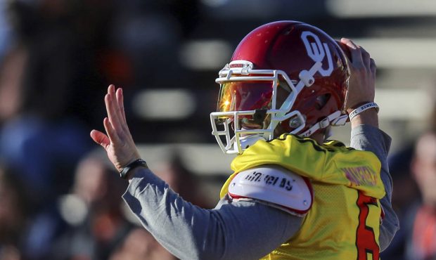 North Squad quarterback Baker Mayfield of Oklahoma (6) throws a pass during the North's team colleg...