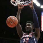 Arizona forward Deandre Ayton dunks during the first half of the team's NCAA college basketball game against Washington State in Pullman, Wash., Wednesday, Jan. 31, 2018. (AP Photo/Young Kwak)