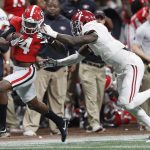 Georgia wide receiver Mecole Hardman gets past Alabama defensive back Tony Brown for a touchdown catch during the second half of the NCAA college football playoff championship game Monday, Jan. 8, 2018, in Atlanta. (AP Photo/David Goldman)